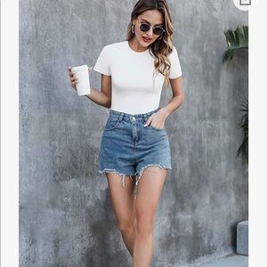 White cotton short sleeve body suit. Never worn.